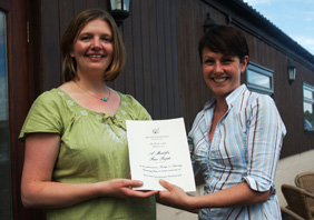 Manager Louise Bonnar presents out latest competition winner Joanne Green